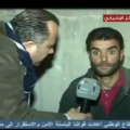 لقطة من تقرير بثته قناة "الاخبارية" عن شخص قالت إنه مقاتل قبض عليه في يبرود واتهمت القناة بأنها فبركته - يوتيوب/ أخبار الشام