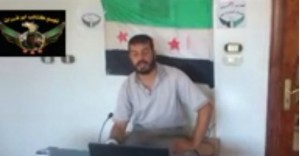 Statement by the commander of the Yousef Al Jader Battalion accusing the Nusra Front of committing crimes. Credit:YouTube