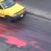 A street dyed red in protest of shelling the Aleppo University in January. Credit: YouTube.