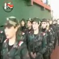 Caption: Women enlisted in the Popular Committees pro-government militias -- YouTube