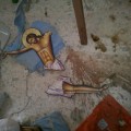 A broken icon inside the Harasta church. Photography by Razan Zeitouneh