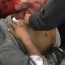 An injured man receives treatment in Kfar Nabl. Credit: YouTube