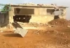 This farm chicken in village if Azzan outside Aleppo was used as a military post by pro-Assad militias and then captured by fighters from Ahrar al-Sham in November. Credit: YouTube.