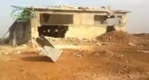 This farm chicken in village if Azzan outside Aleppo was used as a military post by pro-Assad militias and then captured by fighters from Ahrar al-Sham in November. Credit: YouTube.