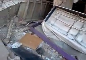 A destroyed pharmacy in Damascus. Credit: YouTube.
