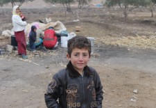 : Eight-year-old Satouf al-Hasan has never attended school because he has constantly been displaced since he was six years old. Photo: Damascus Bureau