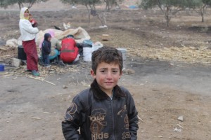 : Eight-year-old Satouf al-Hasan has never attended school because he has constantly been displaced since he was six years old. Photo: Damascus Bureau