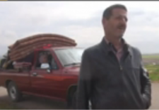 A resident of Khan Shaykhoun in Idlib province flees the fighting - YouTube/Orient News