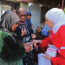 Internally displaced women receive medication from the Syrian Red Crescent. Photo credit: Enab Baladi