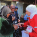 Internally displaced women receive medication from the Syrian Red Crescent. Photo credit: Enab Baladi