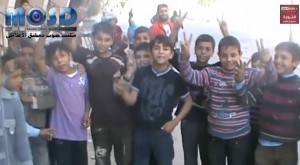 Children in a suburb south of Damascus. Credit: YouTube