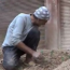 A Daraya resident turns a side street into a vegetable plot. Credit: YouTube/ Daraya Local Council