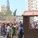 A large protest in support of the rebel fighters in Aleppo. Photography: Salah al-Ashqar