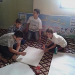 صبية يرسمون في مركز ألوان تصوير مها رباح