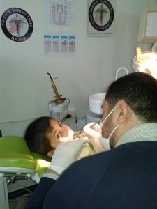 A child is examined at a SMAS clinic. Photo: Hadia Mansour
